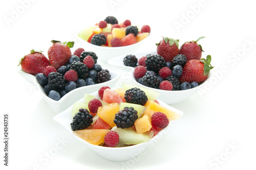 Berries and fruit in bowls