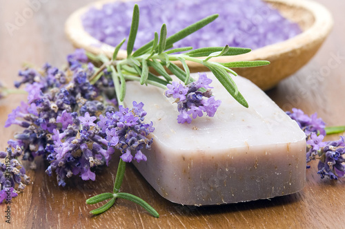 bar of natural soap, herbs and bath salt photo