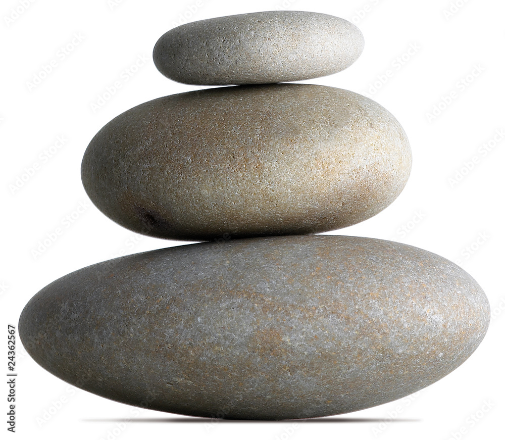 three pebbles balancing on each other on a white background three pebbles balancing on each other on a white background