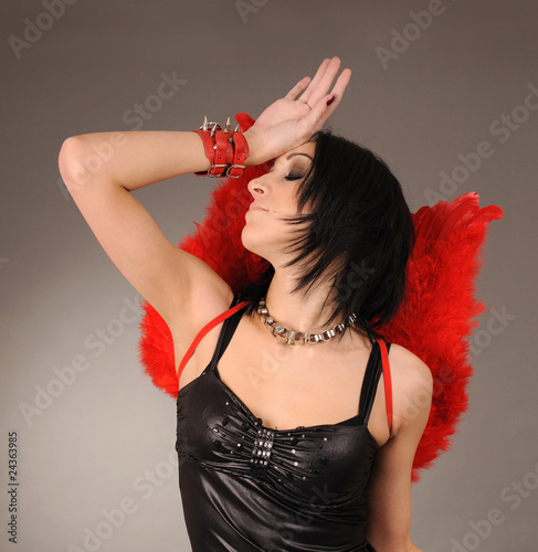 girl with wings and handcuffs