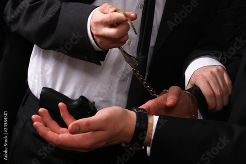 business man being handcuffed