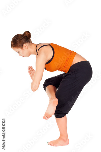 Young Fit Woman Practicing Yoga Exercise