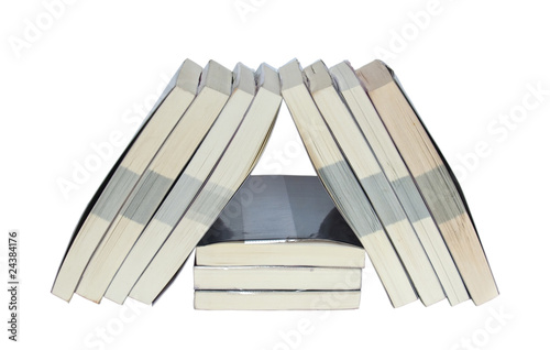 Foto Real books arrange in triangle
