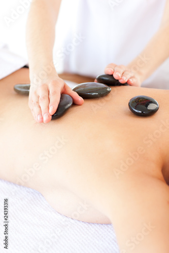 Caucasian woman having a stone therapy