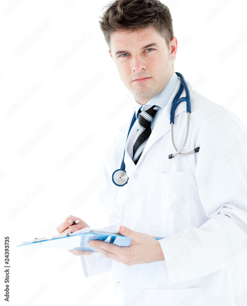 Self-assured male doctor holding a clipboard Self-assured male doctor holding a clipboard