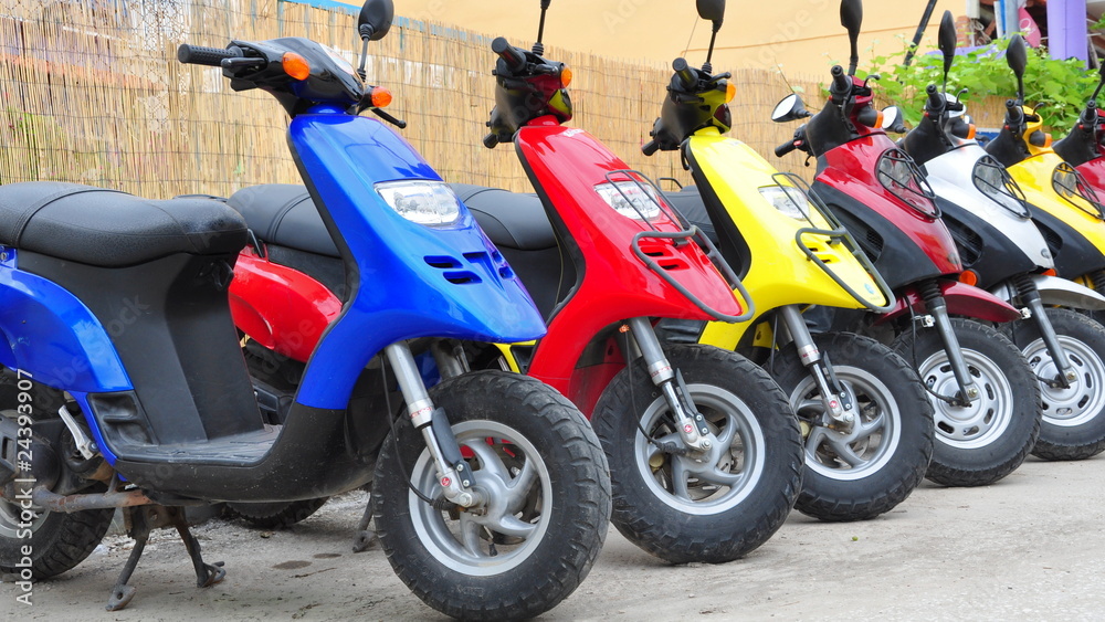 Fototapeta premium Scooter motorbikes in the line