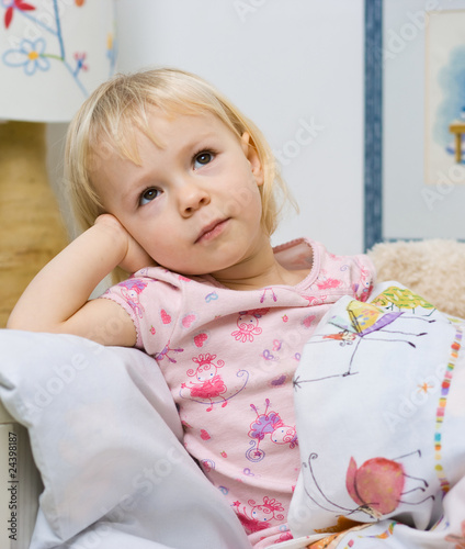 little girl in bed