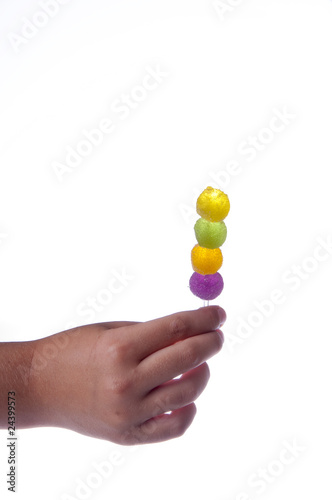 Jelly lollipop in the child hand