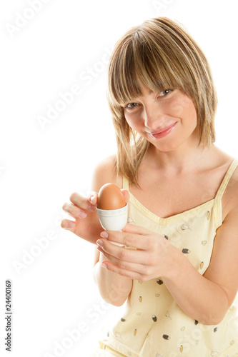 Woman with boiled egg