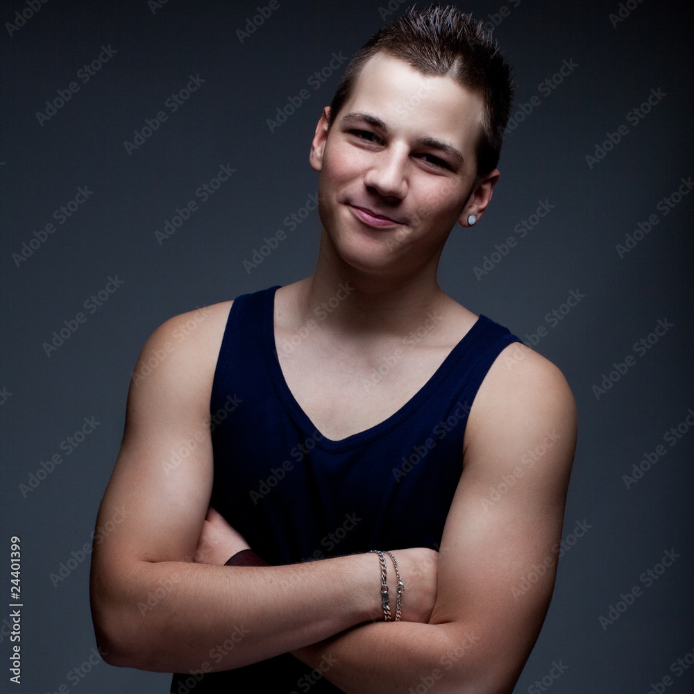 Naklejka premium smiling strong teenager