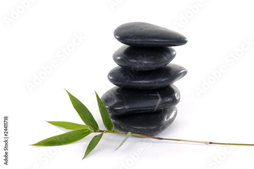 Black zen stones with bamboo leaf