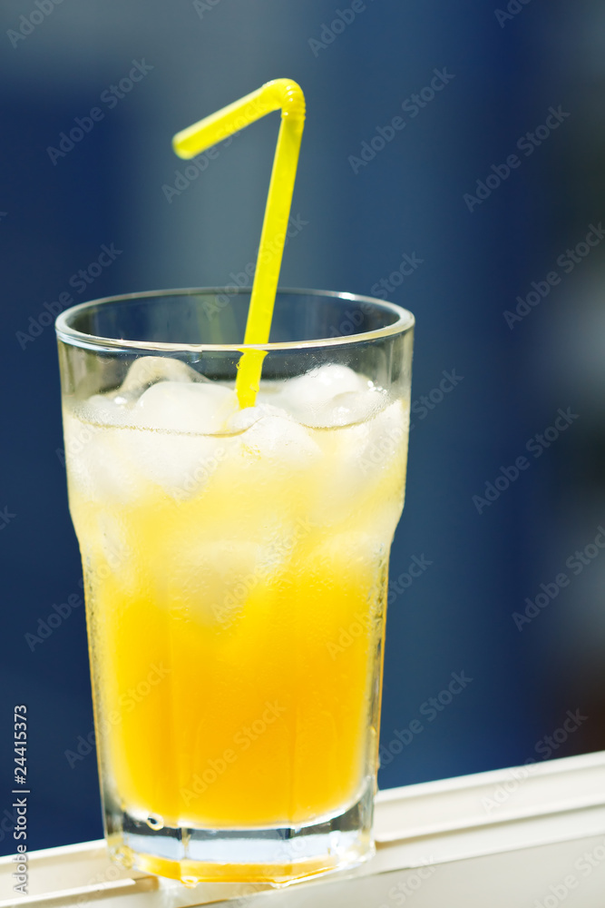 glass of orange juice with ice glass of orange juice with ice