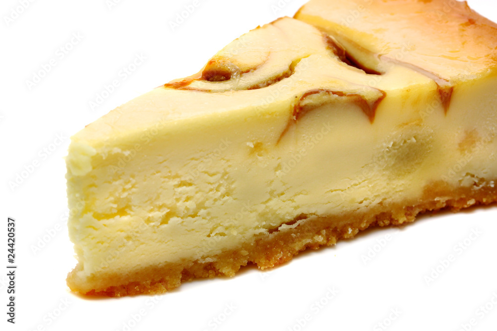 Gourmet slice of cheesecake on the white background Gourmet slice of cheesecake on the white background