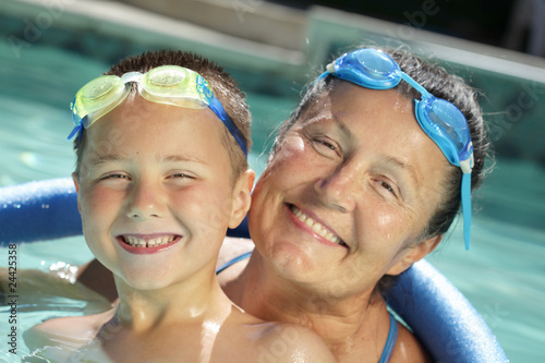 Grandma and child in the pool