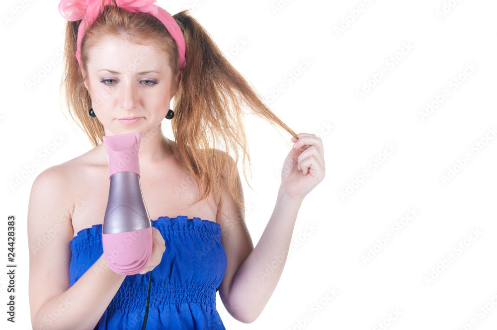red-haired girl with the hair dryer. red-haired girl with the hair dryer.