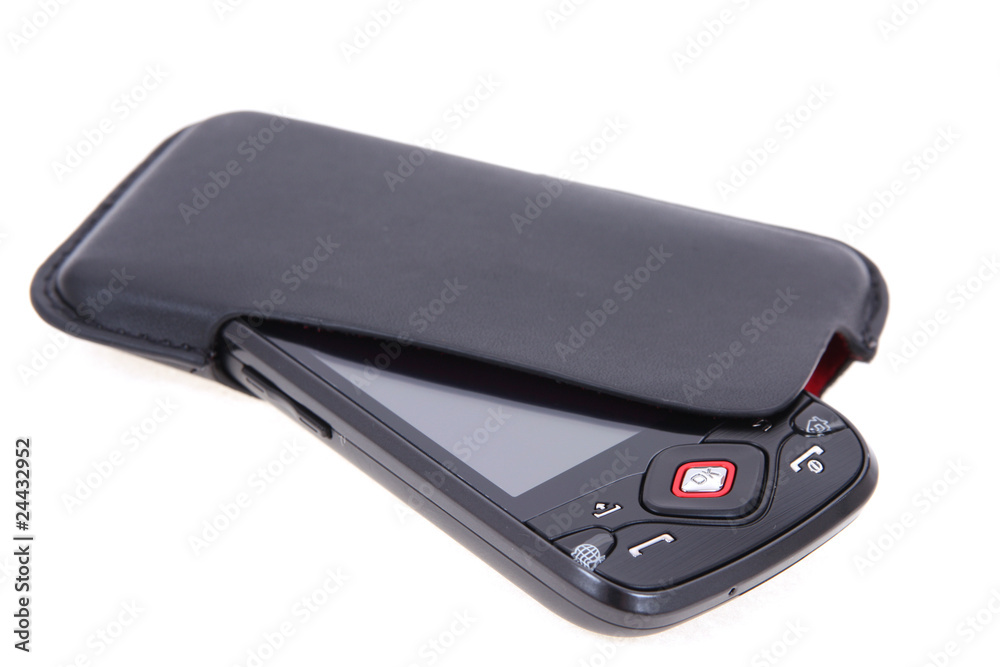 Black mobile phone on packet Black mobile phone on packet