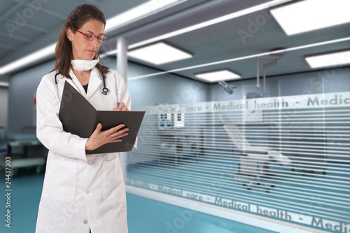 Woman doctor taking notes