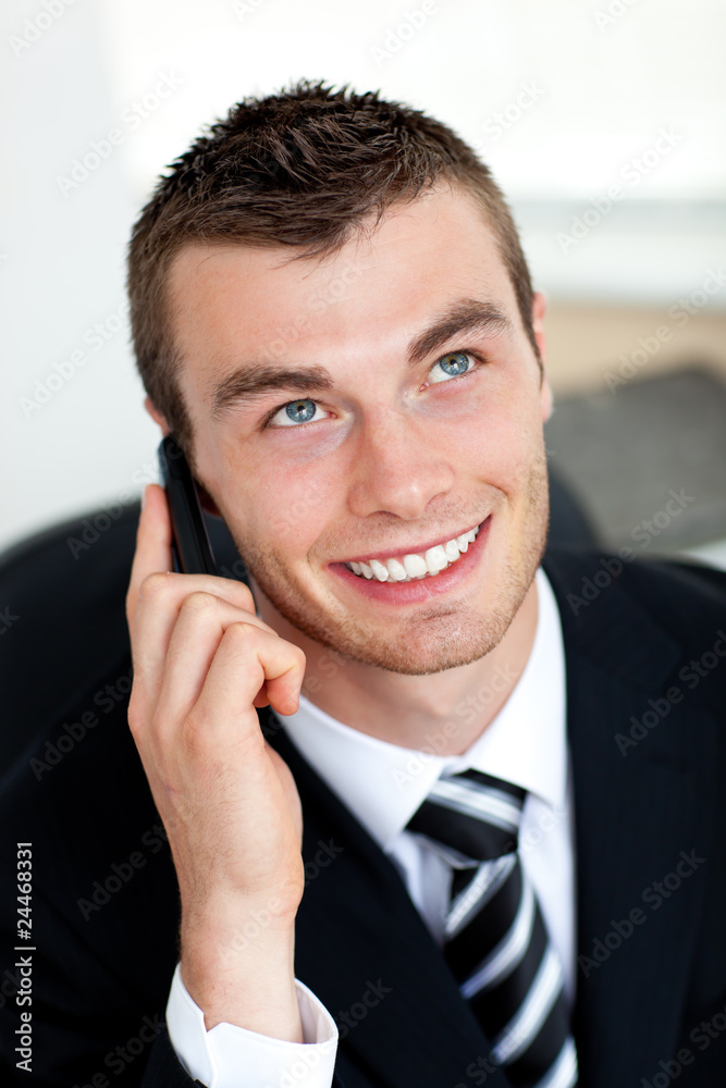 Simper businessman using mobile phone Simper businessman using mobile phone