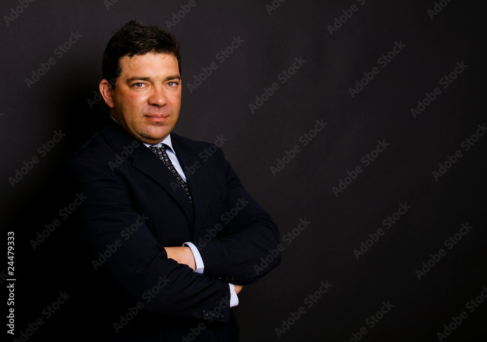 mature business man portrait on black background mature business man portrait on black background