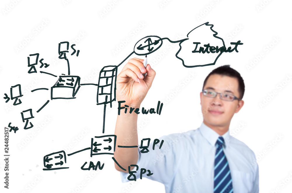 young computer Engineer drawing network diagram young computer Engineer drawing network diagram