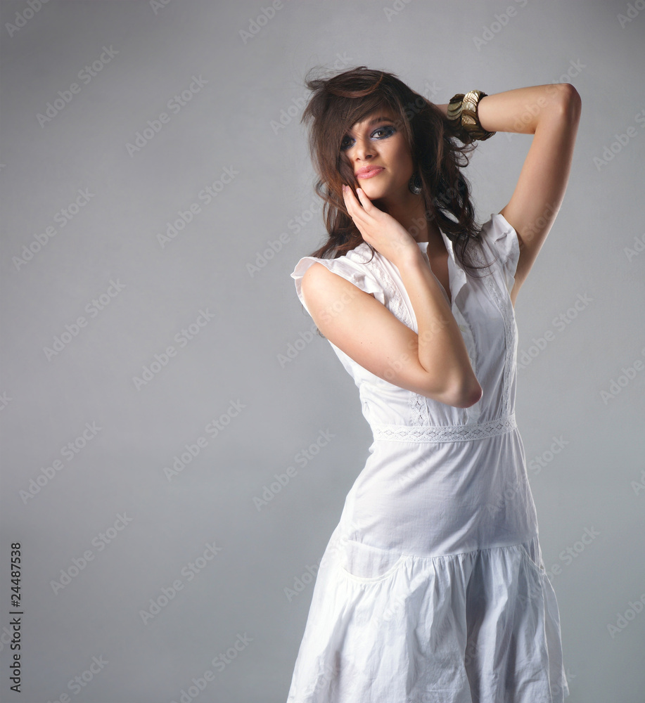 Fashion shoot of an attractive sexy lady dressed in white Fashion shoot of an attractive sexy lady dressed in white