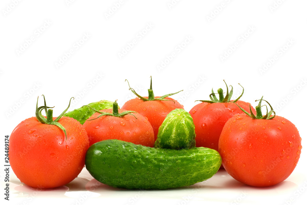 fresh tomatoes and cucumbers isolated on white background fresh tomatoes and cucumbers isolated on white background
