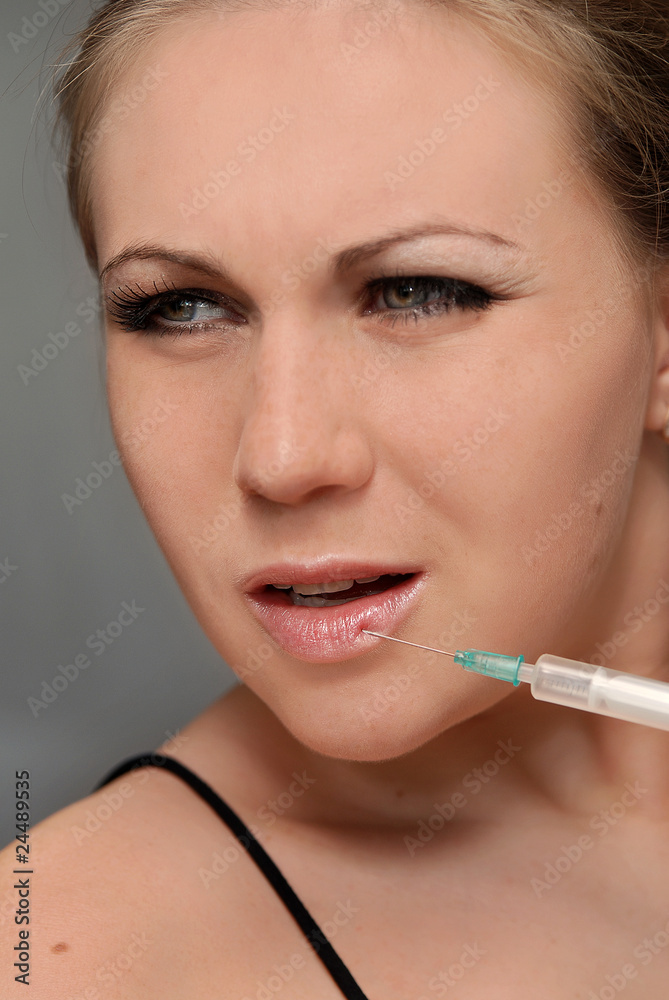 Injection on lips of a young girl