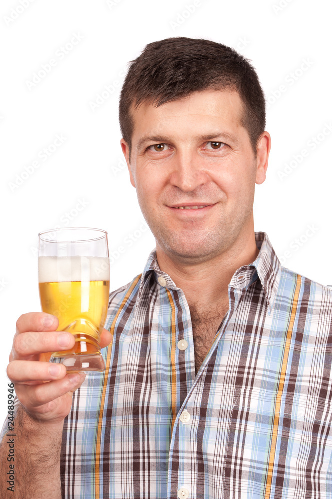 Man holding a glass of beer Man holding a glass of beer