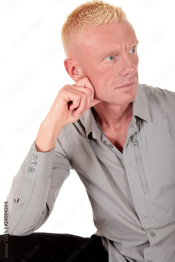 Blond man forties pensive Blond man forties pensive
