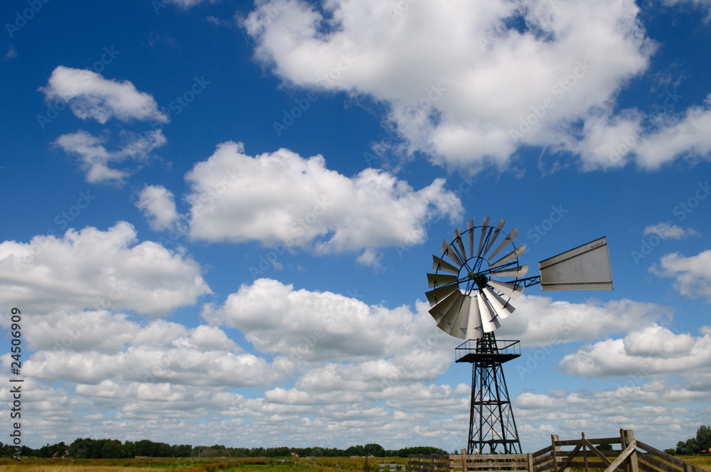 windmill against great blue sky windmill against great blue sky
