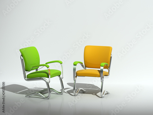 two chairs near wall