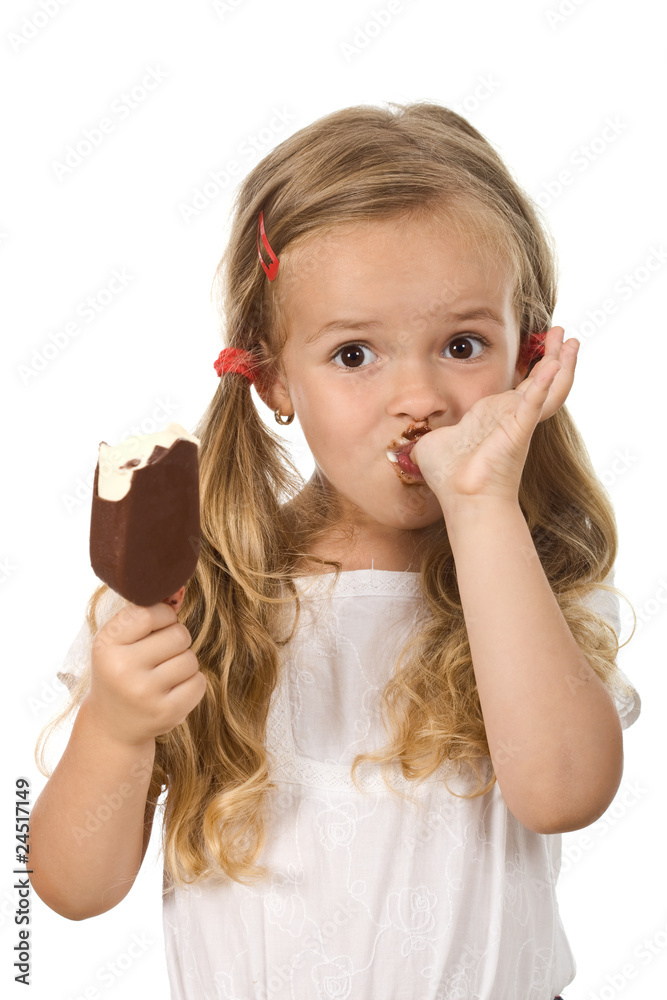 Little girl eating icecream licking fingers Little girl eating icecream licking fingers