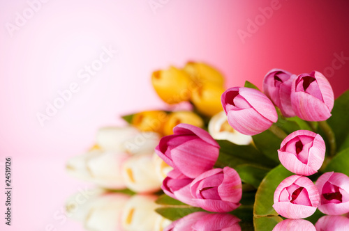 Fototapeta Naklejka Na Ścianę i Meble -  Bouquet of colorful tulips on the table
