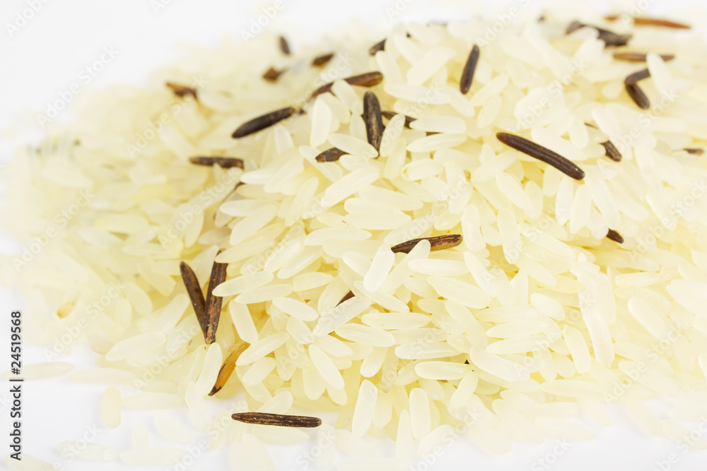 Closeup of long rice mixed with wild rice isolated on white Closeup of long rice mixed with wild rice isolated on white