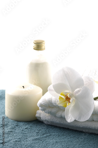 spa and wellness massage oil and flowers with candles