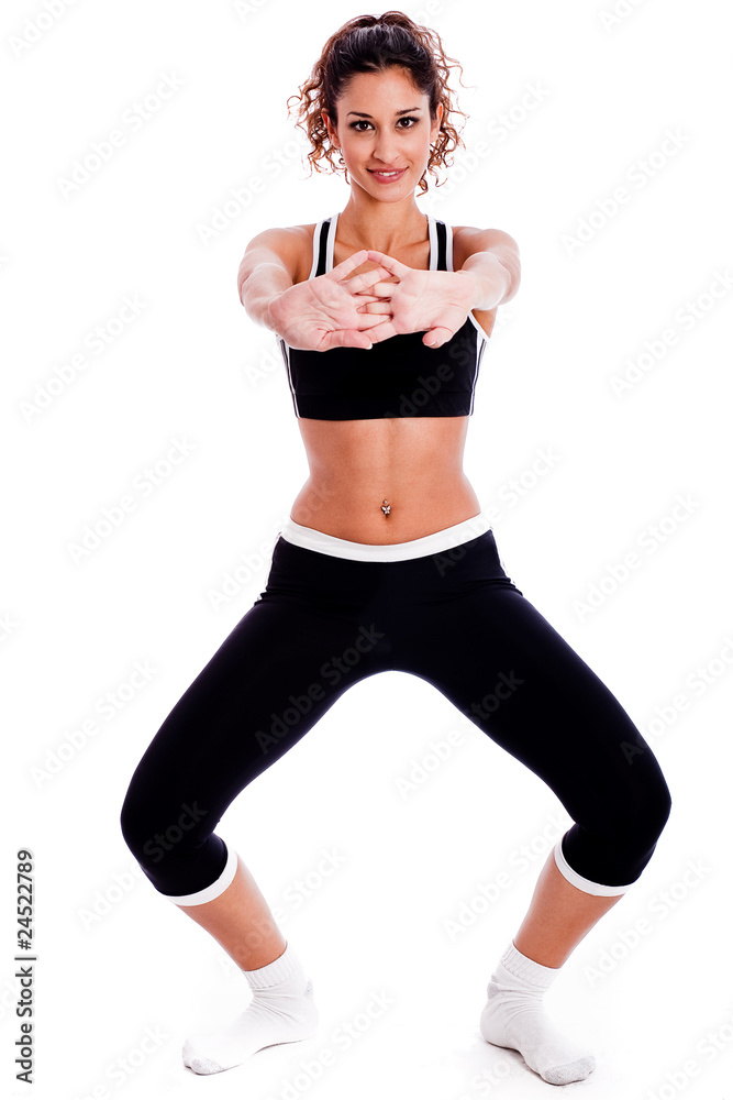 Cute fitness girl stretching her hands Cute fitness girl stretching her hands