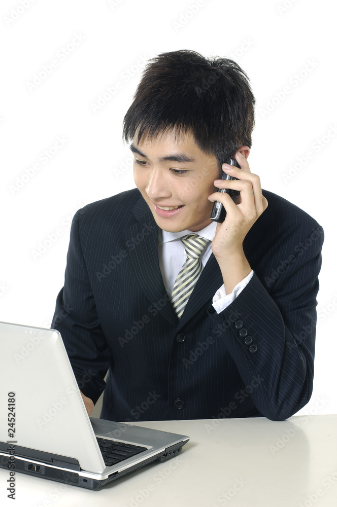 smiling business man working with laptop. smiling business man working with laptop.