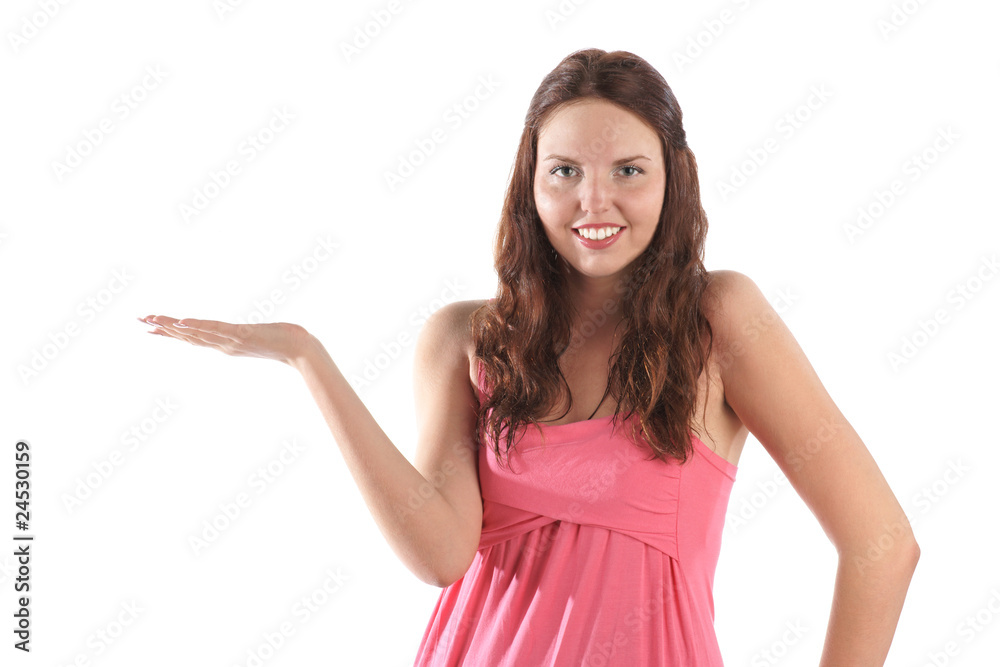 Smiling girl in pink dress presenting things (isolated) Smiling girl in pink dress presenting things (isolated)