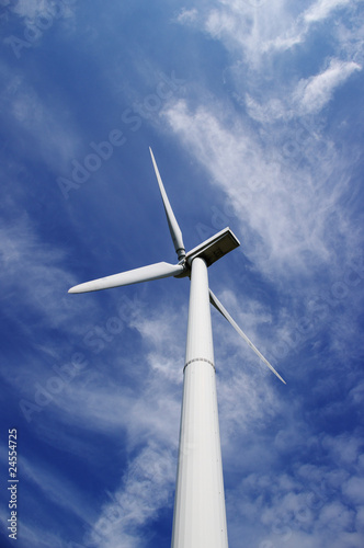 White windmill under blue sky