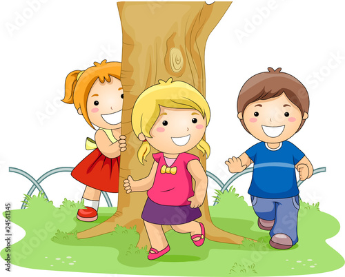 Children Running Around The Tree In The Park