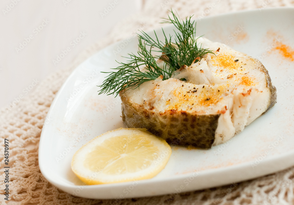 Baked cad served with lemon and dill Baked cad served with lemon and dill