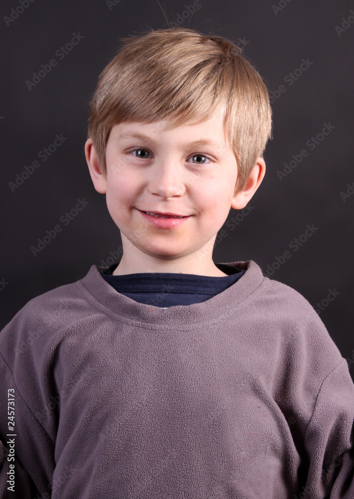 Cute young eight year old boy Stock Photo | Adobe Stock