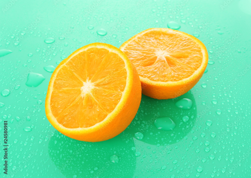 Wet orange on green background Wet orange on green background
