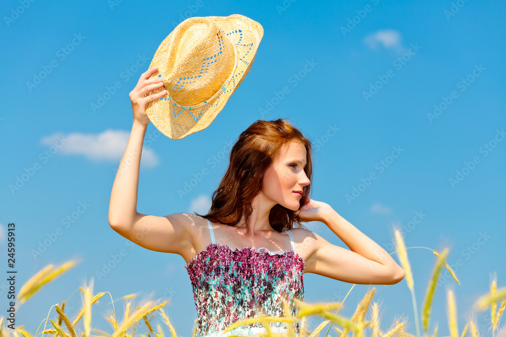 Pretty woman in a field