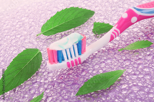 tooth brush and mint leaves