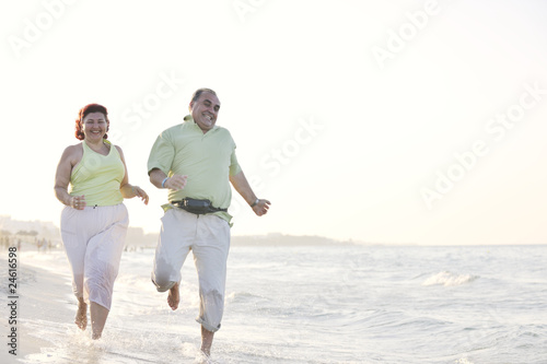 happy seniors couple  on beach © .shock