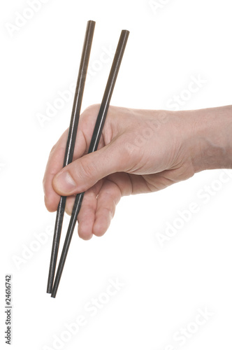 well shaped hand with a chopsticks isolated over white