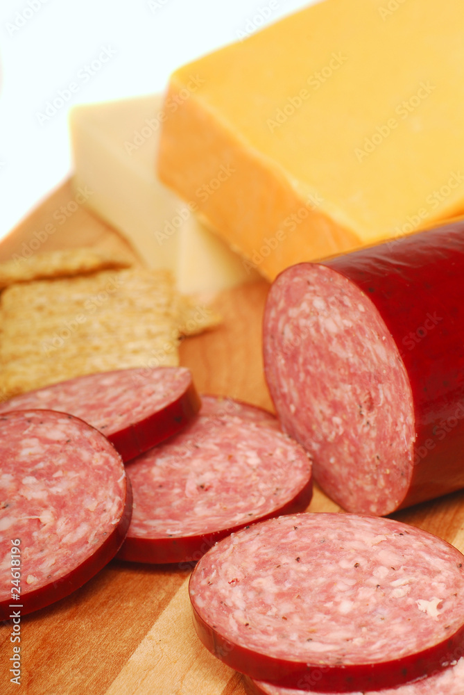 Salami with cheese and crackers Salami with cheese and crackers