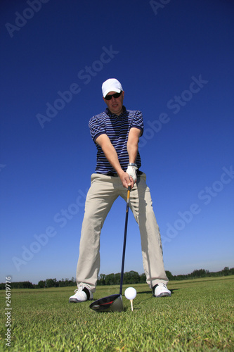 GOLF - golf player with driver
