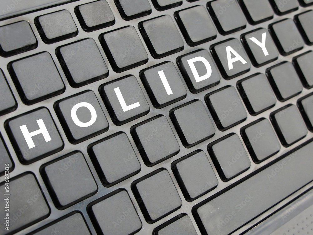 HOLIDAY text on the keyboard